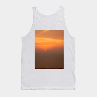 Bright golden sunset over the sea with one paraglider Tank Top